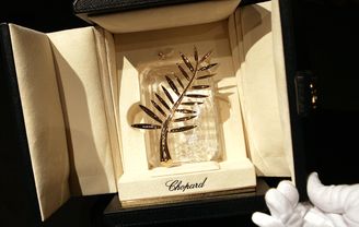 The trophy is then placed in a case of royal blue Moroccan leather. In 2011, after Lars von Trier dropped the Palme while brandishing it a little too enthusiastically, a safety mechanism was added to the case to secure the Palme in place.