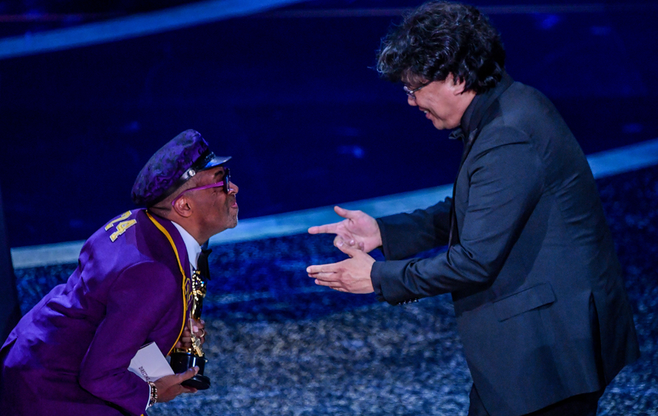 Bong Joon-ho receiving the Oscar for best director from Spike Lee